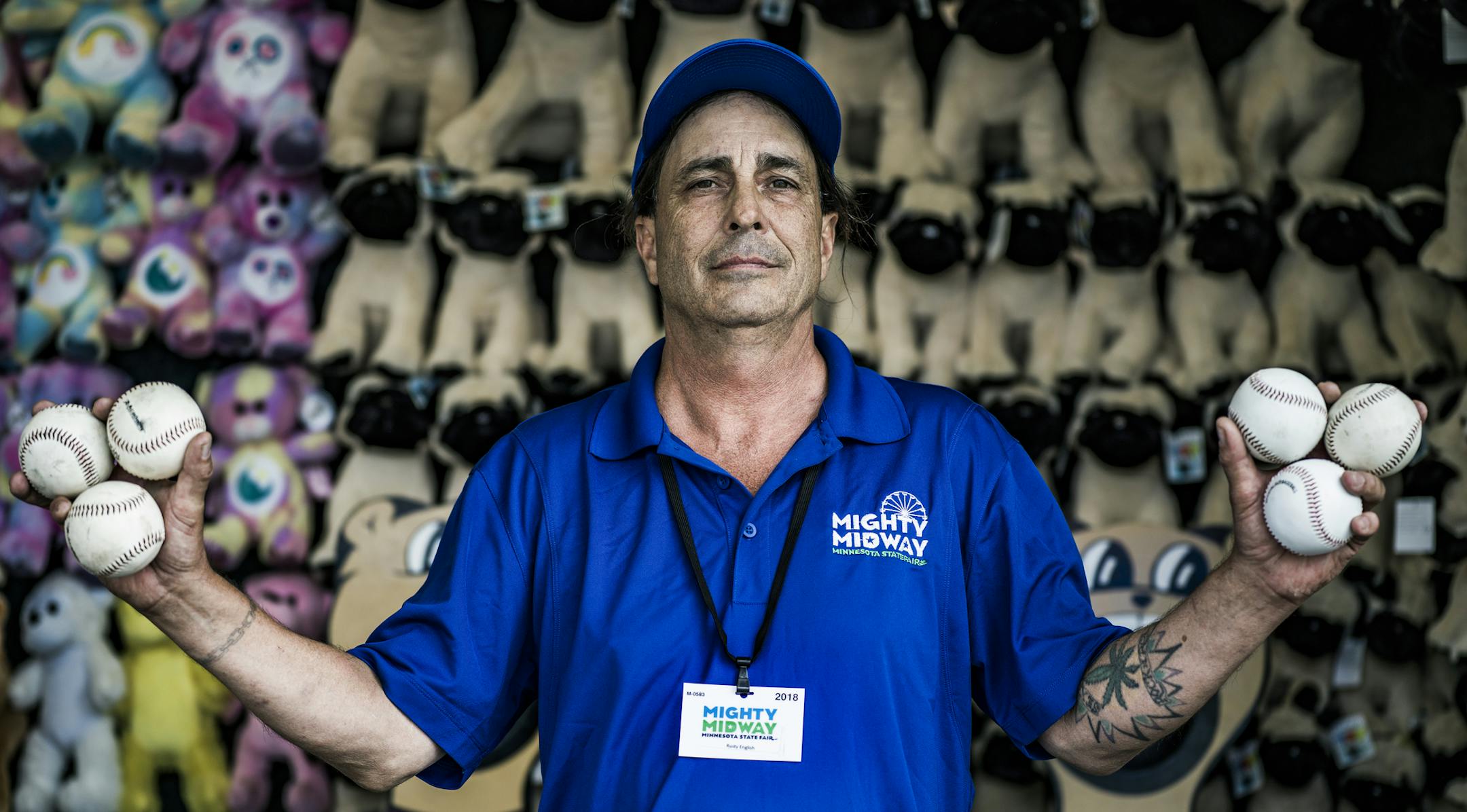 Rusty English who is from a little town 100 miles south of Charleston, West Virginia, has been on the fair circuit for 34 years. His days are long, 15 to 16 hours for the duration each fair including this one.] Scenes of the Midway for Minnesota Strate Fair wrap. Richard Tsong-Taatarii•Richard.Tsong-Taatarii@startribune.com