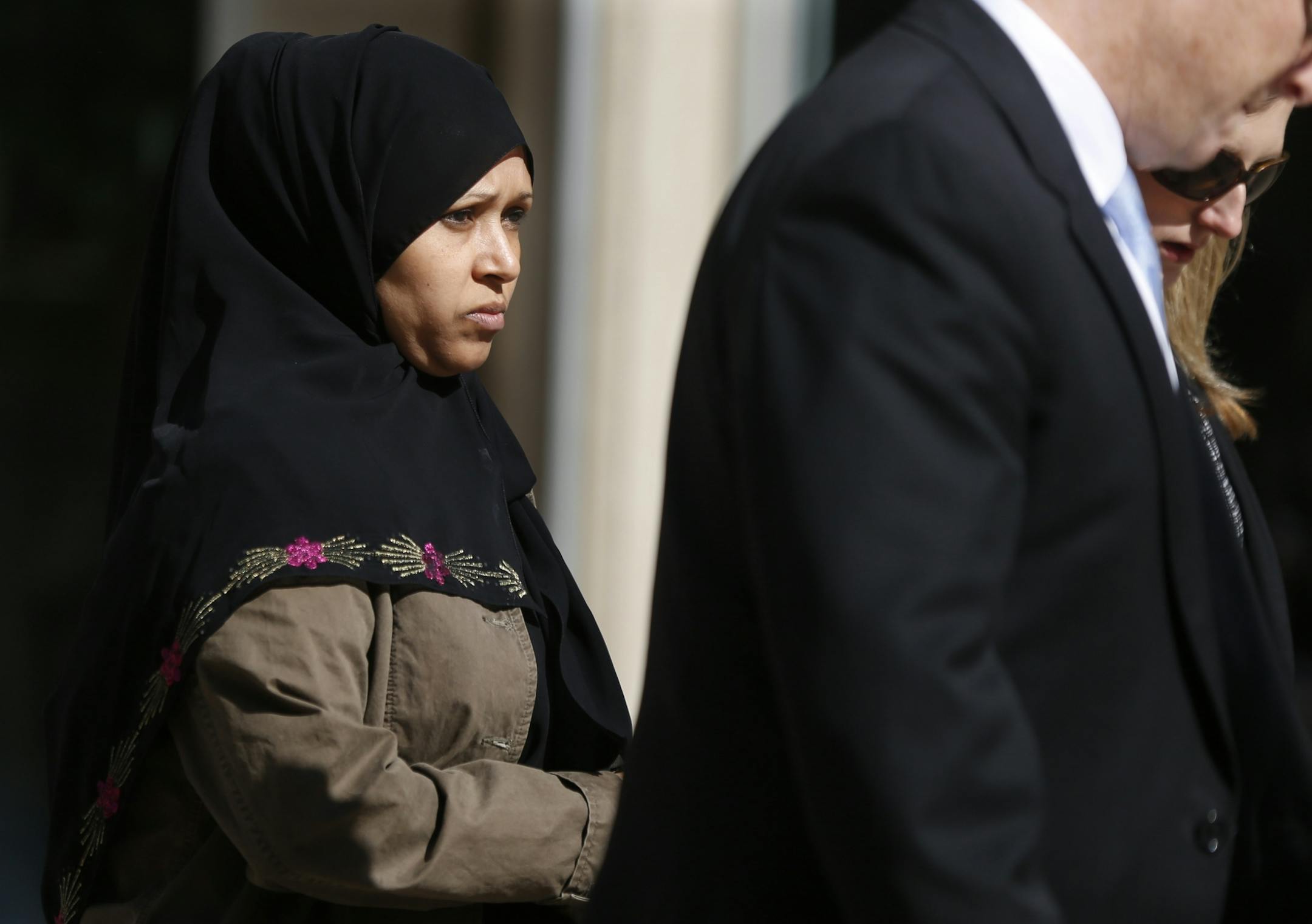 Mother of slain man left court after testifying about phone call from Somalia.