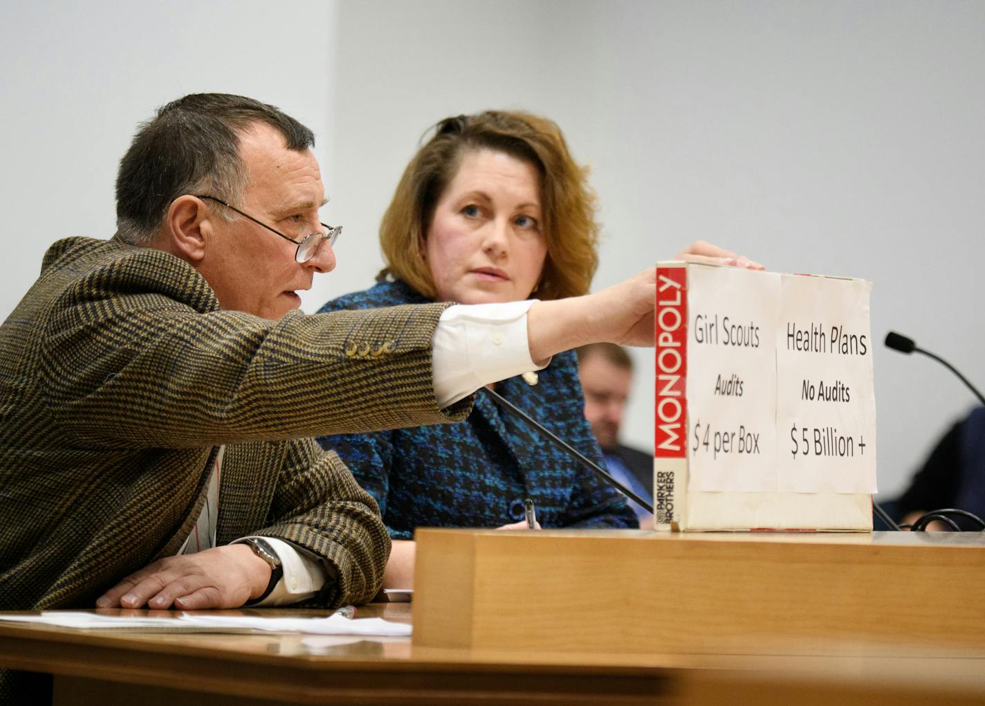 Senator Michelle Benson, R-Ham Lake looked on as Jim Grotz of Edina complained about the lack of auditing of companies that currently run health plans in Minnesota. Senator Benson brought her Health insurance premium assistance bill to the Senate Commerce Committee. ] GLEN STUBBE * gstubbe@startribune.com Tuesday, January 10, 2017 Senator Michelle Benson, R- Ham Lake spoke about her Health insurance premium assistance bill in front of the Senate Commerce Committee.