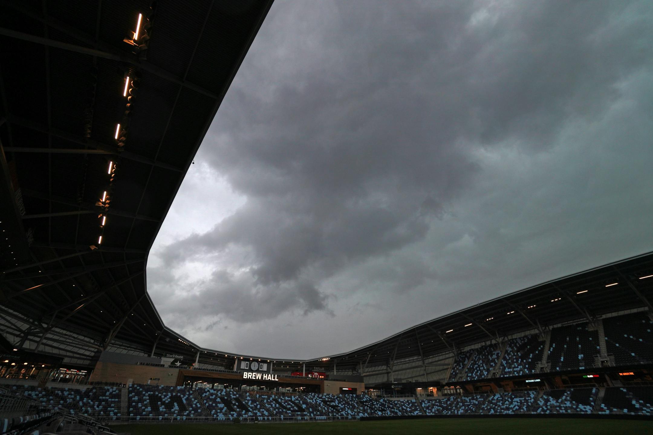The City of Saint Paul and Minnesota United unveiled an interpretive monument honoring the new cutting-edge rainwater reuse system, complete with laser-etched diagrams of the water harvesting process and tree-trench irrigation system. Here, storm clouds roll over Allianz Field Thursday morning.