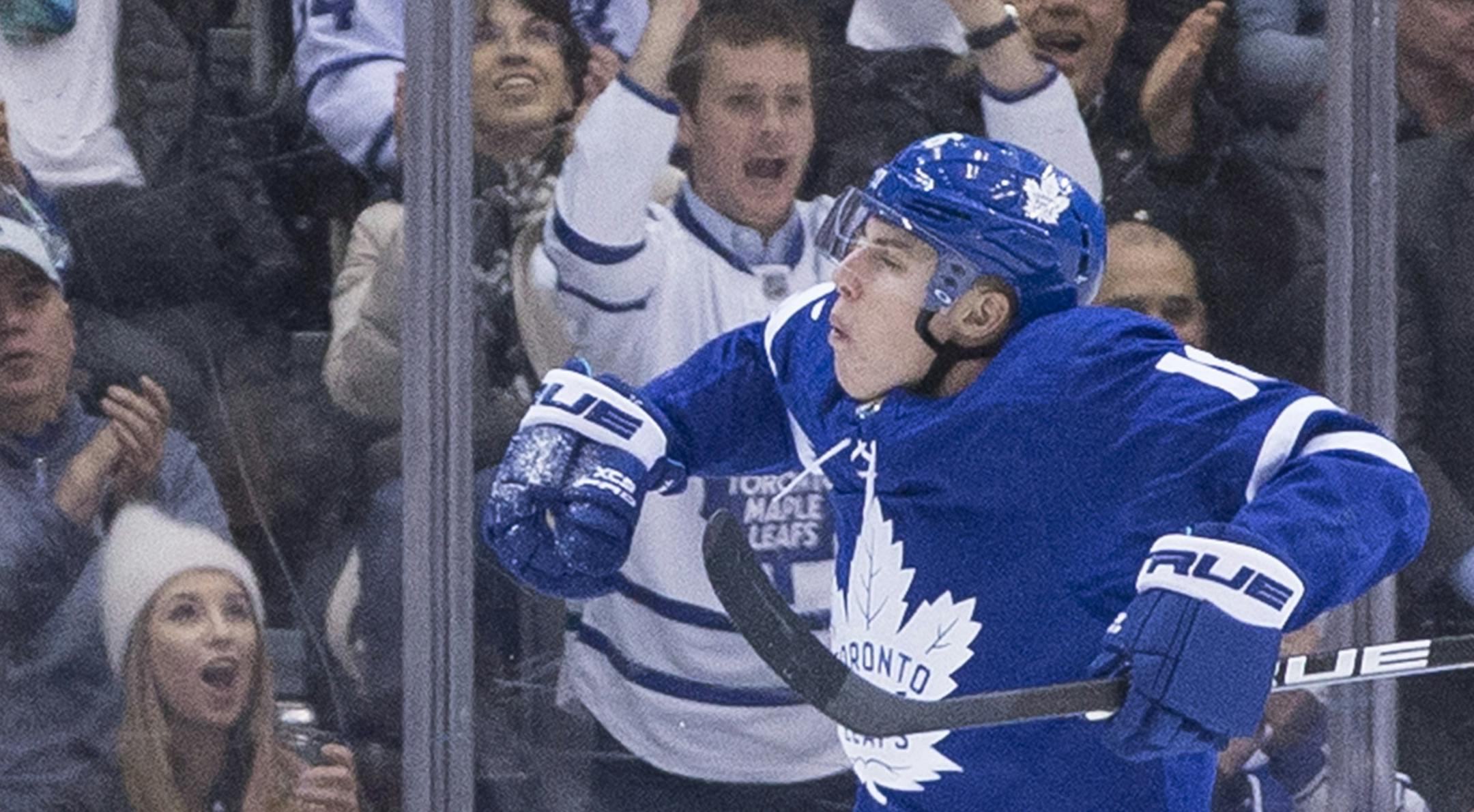 Toronto Maple Leafs' Mitchell Marner celebrates after scoring against the New York Islanders during first-period NHL hockey game action in Toronto on Thursday, Feb. 22, 2018. (Chris Young/The Canadian Press via AP)