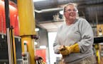 Monday was Claudine Vogel's first day at Aurelius Manufacturing, which employs 75 people in Braham, Minn.