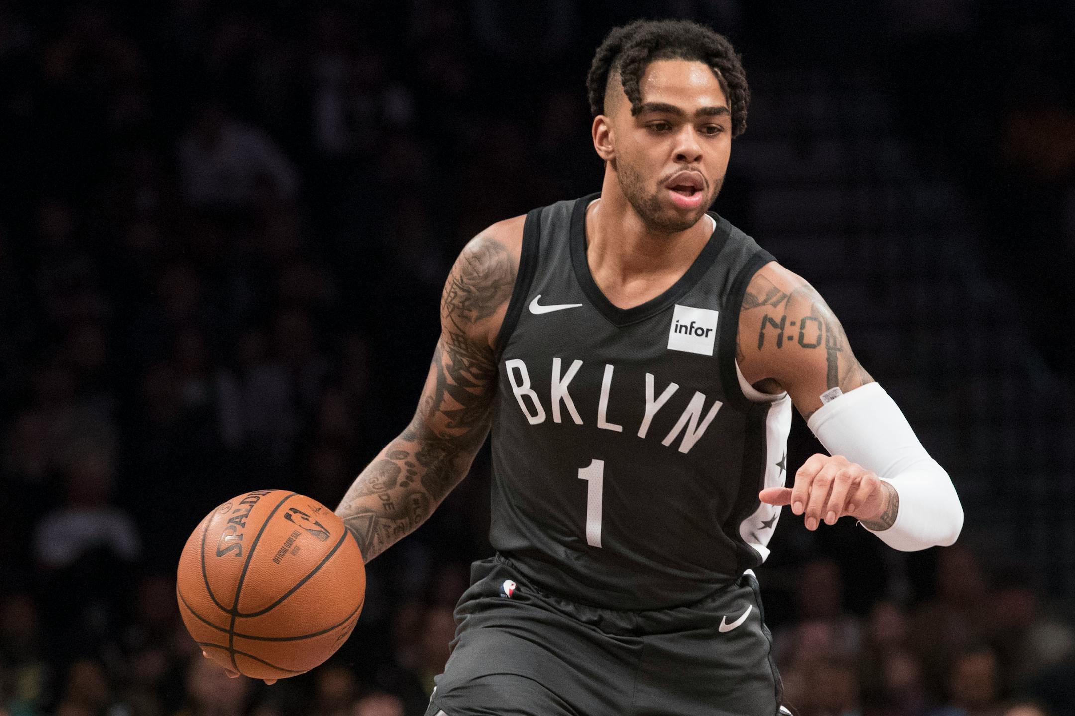 Brooklyn Nets guard D'Angelo Russell handles the ball during the first half of an NBA basketball game against the Boston Celtics, Saturday, March 30, 2019, in New York. (AP Photo/Mary Altaffer)