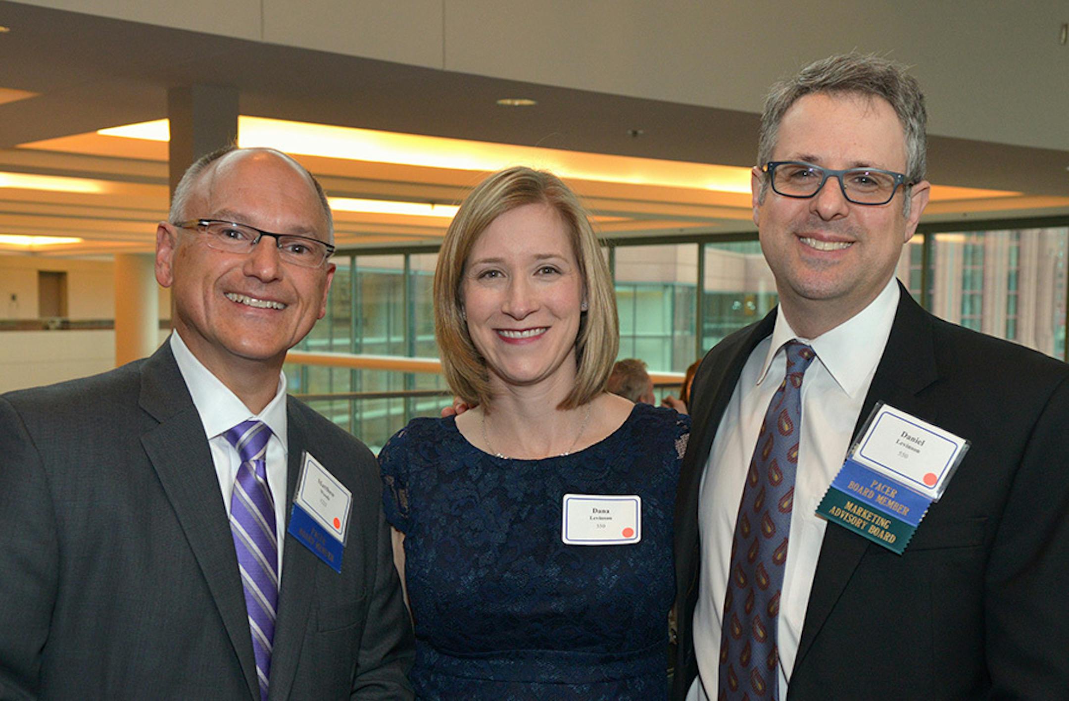 From left, Matt Woods and Dana and Dan Levison.