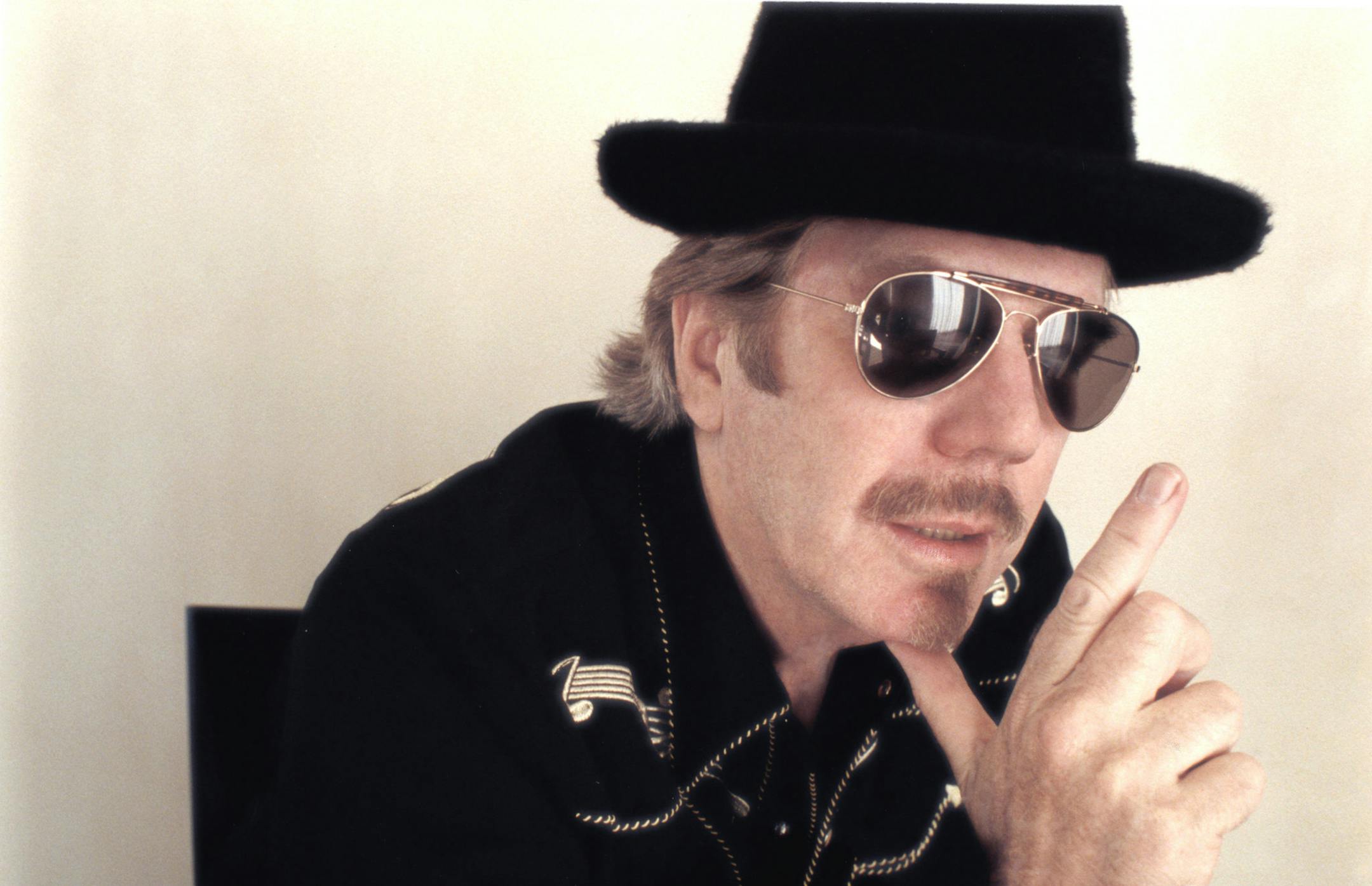 Photo by Jenee Crayne; Publicity photo of Dan Hicks