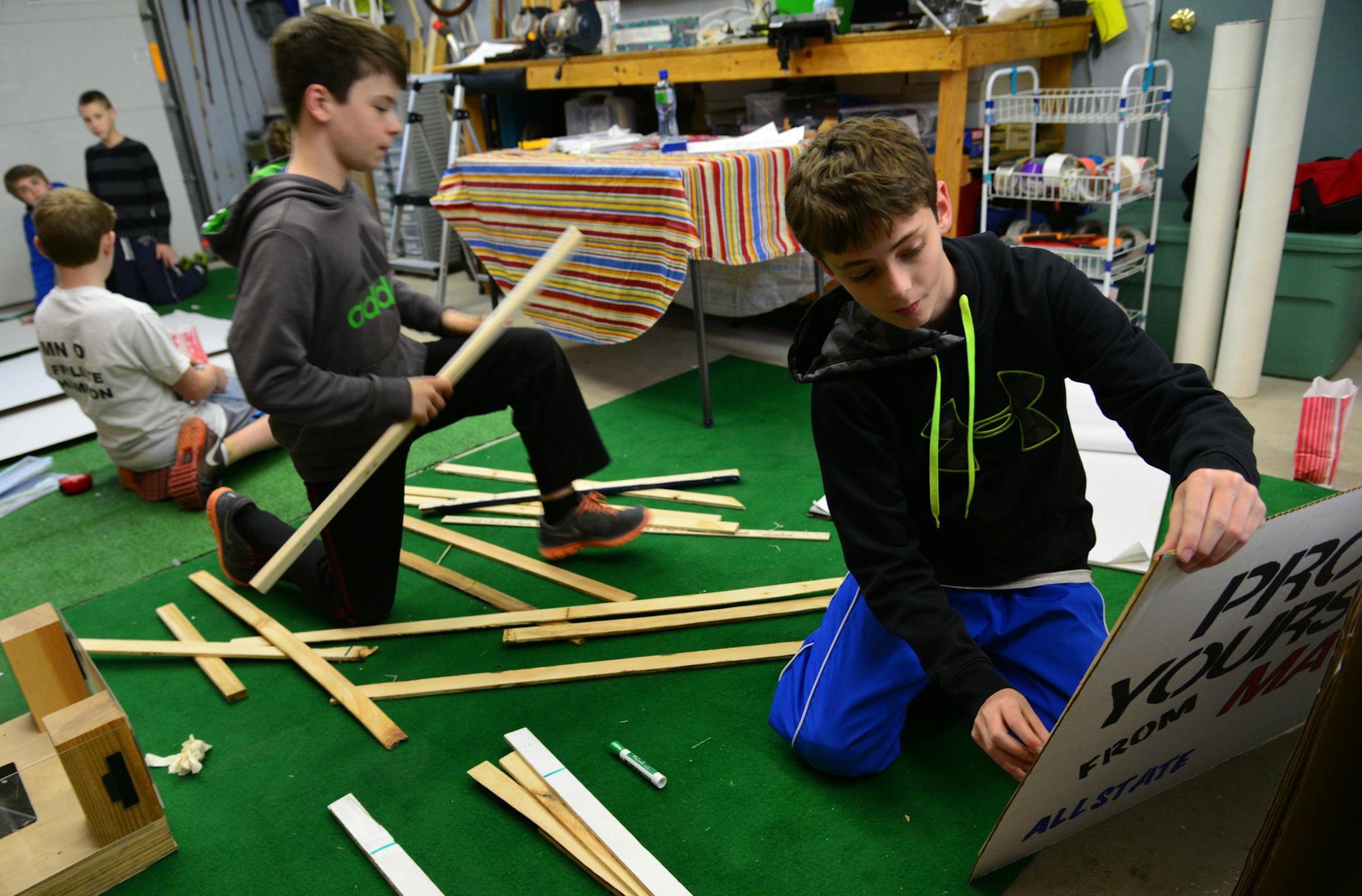 Jack Burright and Brian Dilla work assembling parts of their Destination Imagination project in the garage lab. ] Destination Imagination is a program for students of all ages that encourages creative problem solving and teamwork. Nine teams from Rosemount -Apple Valley-Eagan will attend global finals after placing in the top three in their category at state finals last week. This is a profile of two teams from Dakota Hills Middle School as they prepare to move to the next level. Richard.Sennott