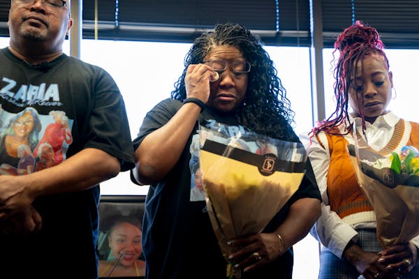 Maria Greer, mother of Zaria McKeever who was murdered in a home invasion in November 2022, mourns Zaria with her family members at a small prayer vig