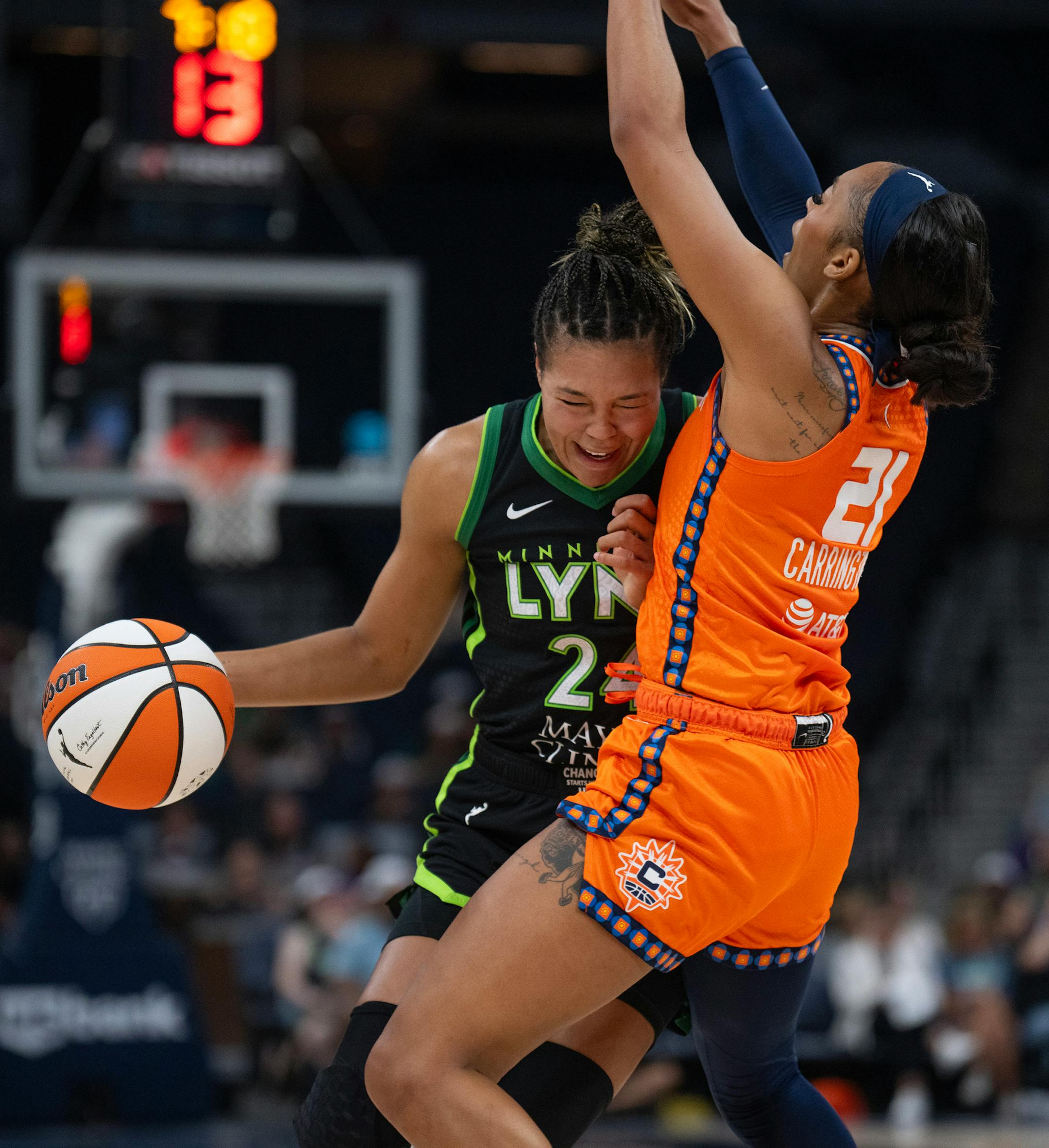 Minnesota Lynx forward Napheesa Collier (24) drove into Connecticut Sun guard DiJonai Carrington (21) in the second quarter Thursday night. The Minnesota Lynx faced the Connecticut Sun in a WNBA game Thursday night, June 22, 2023 at Target Center in Minneapolis.