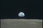 A photo provided by NASA shows Earth as seen from the Apollo 11 lunar mission in July 1969. Could a &#xd2;moon shot&#xd3; for climate change cool a wa