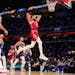 Timberwolves forward Karl-Anthony Towns dunked for two of his game-high 50 points during the first half of the East's 211-186 victory over the West in