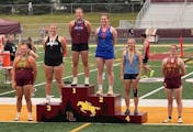 Evelyn Wiltrout grinned from the second spot on the medal stand Friday, the position she needed to claim to qualify for state.