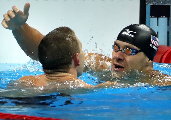 Former U swimmer David Plummer, right, celebrated his bronze medal Monday with teammate Ryan Murphy, who won the gold.