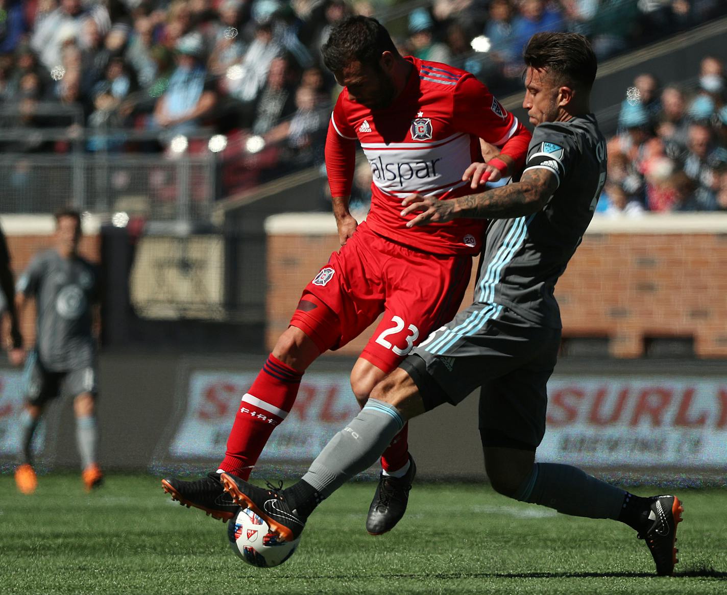 Minnesota United defender Francisco Calvo (5) and Chicago Fire forward Nemanja Nikolic (23) fought for the ball in the first half. ] ANTHONY SOUFFLE &#xef; anthony.souffle@startribune.com The Minnesota United played the Chicago Fire in the season's home opener MLS match Saturday, March 17, 2018 at TCF Bank Stadium in Minneapolis.