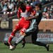 Minnesota United defender Francisco Calvo (5) and Chicago Fire forward Nemanja Nikolic (23) fought for the ball in the first half. ] ANTHONY SOUFFLE &