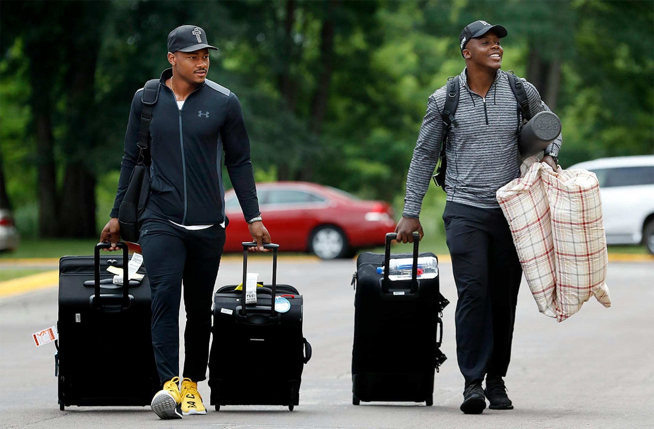 Stefon Diggs and Teddy Bridgewater walked up the dorms after arriving in Mankato for training camp.