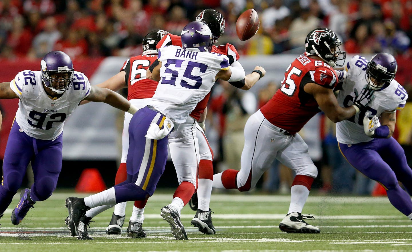 Falcons quarterback Matt Ryan (2) fumbled the ball after being sacked by Vikings linebacker Anthony Barr (55) in the fourth quarter.