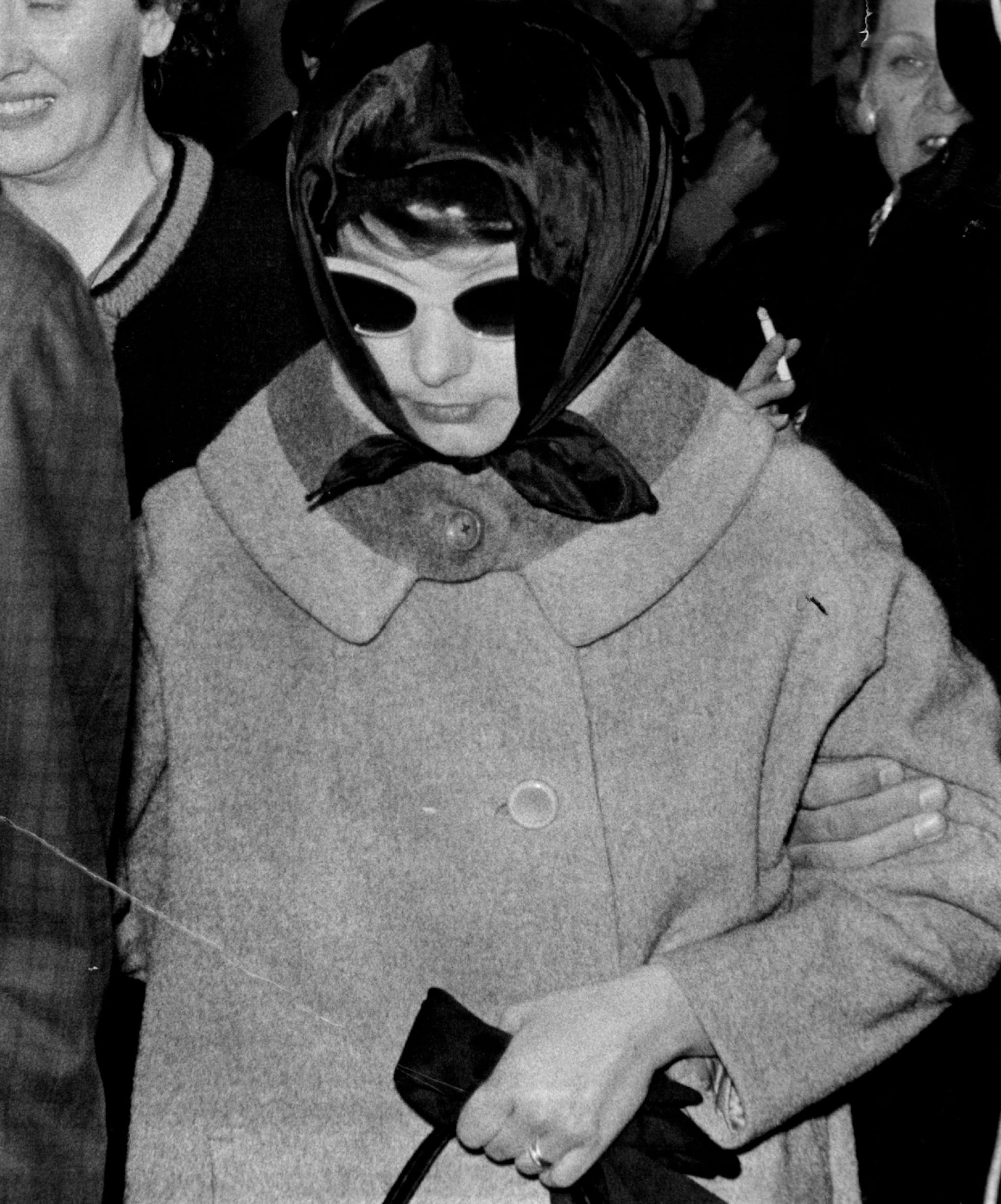 November 14, 1963 MRS. JACQUELINE OLESEN OUTSIDE COURT After she told of romance with Thompson The story of T. Eugene Thompson's extra­marital relations with his 27-year-old former law office secretary was planted in the minds of a Hennepin District Court jury today-but the story had its apparent contradictions. In more than 5,000 words of questions by Ramsey County Attorney William B. Randall and answers by the secretary Mrs. Jacqueline Olesen, the state Wednesday sought to show that Thompson's