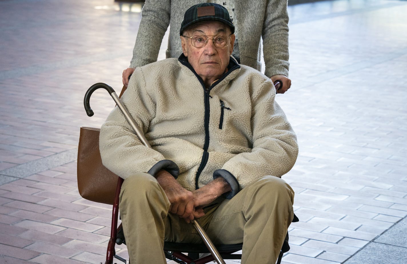 Defendant George R. Jensen entered Hennepin County District Court in February in a wheelchair before pleading guilty to five counts of criminal vehicular operation in the July 9, 2019, incident that left three men in critical condition and three others injured.