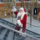 "Santa" waved to people as he made his way to the Christmas photo booth at Southdale Mall, Friday, December 4, 2015 in Edina, MN.
