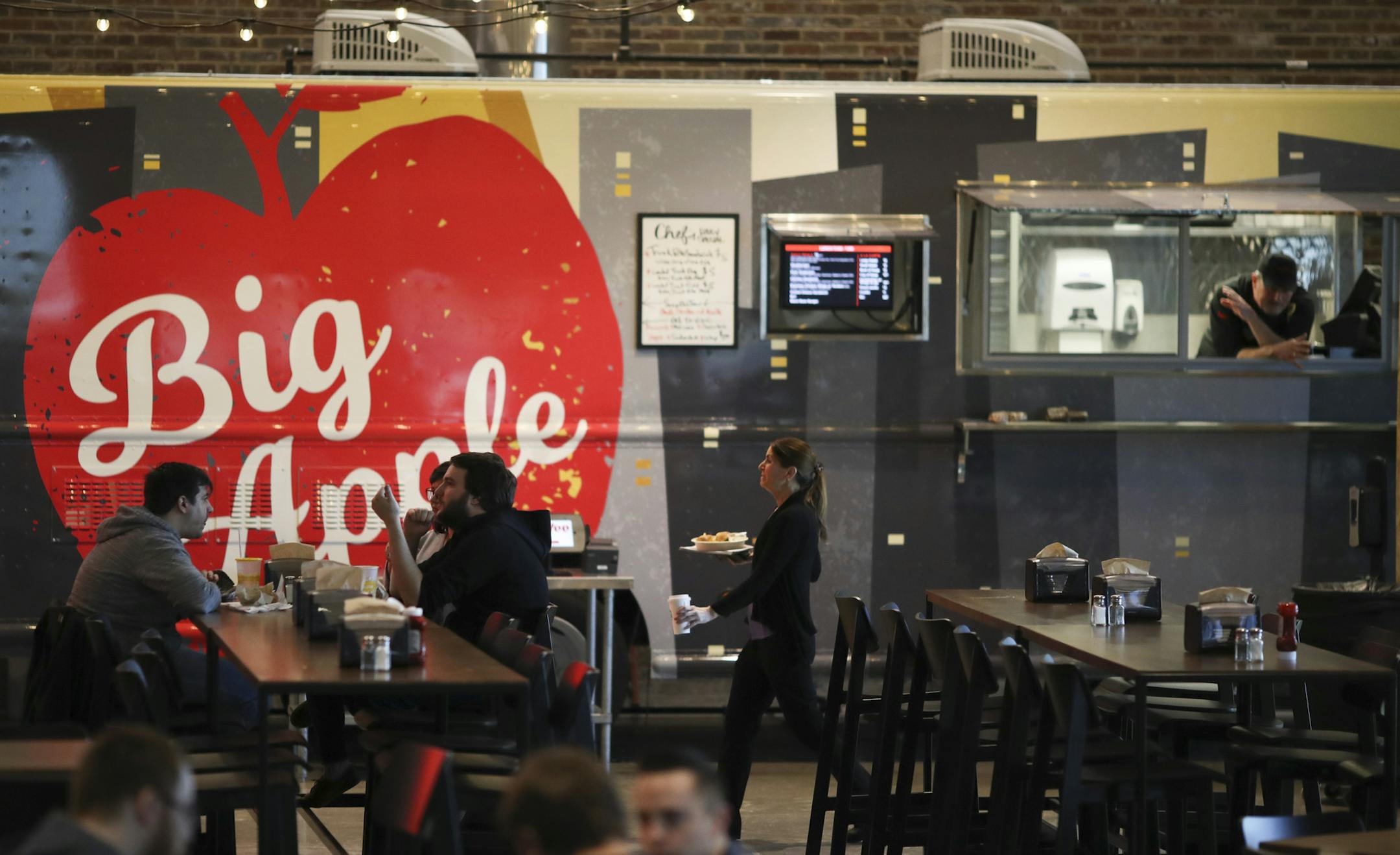 The food truck in the lunch area of the HST Center. ] JEFF WHEELER ï jeff.wheeler@startribune.com Des Moines-based grocery giant Hy-Vee, Inc. opened what they dubbed their Helpful Smiles Technology Center in a cavernous warehouse in Grimes, Iowa last year. We take a look at the features of the 104,000-square-foot building that houses the company's information technology workers, in addition to marketing and accounting employees, Tuesday, March 13, 2018.