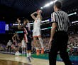 A foul called on Auburn's Samir Doughty put Virginia's Kyle Guy at the foul line in the Final Four semifinals Saturday. Guy sank all three free throws