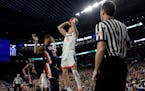 A foul called on Auburn's Samir Doughty put Virginia's Kyle Guy at the foul line in the Final Four semifinals Saturday. Guy sank all three free throws