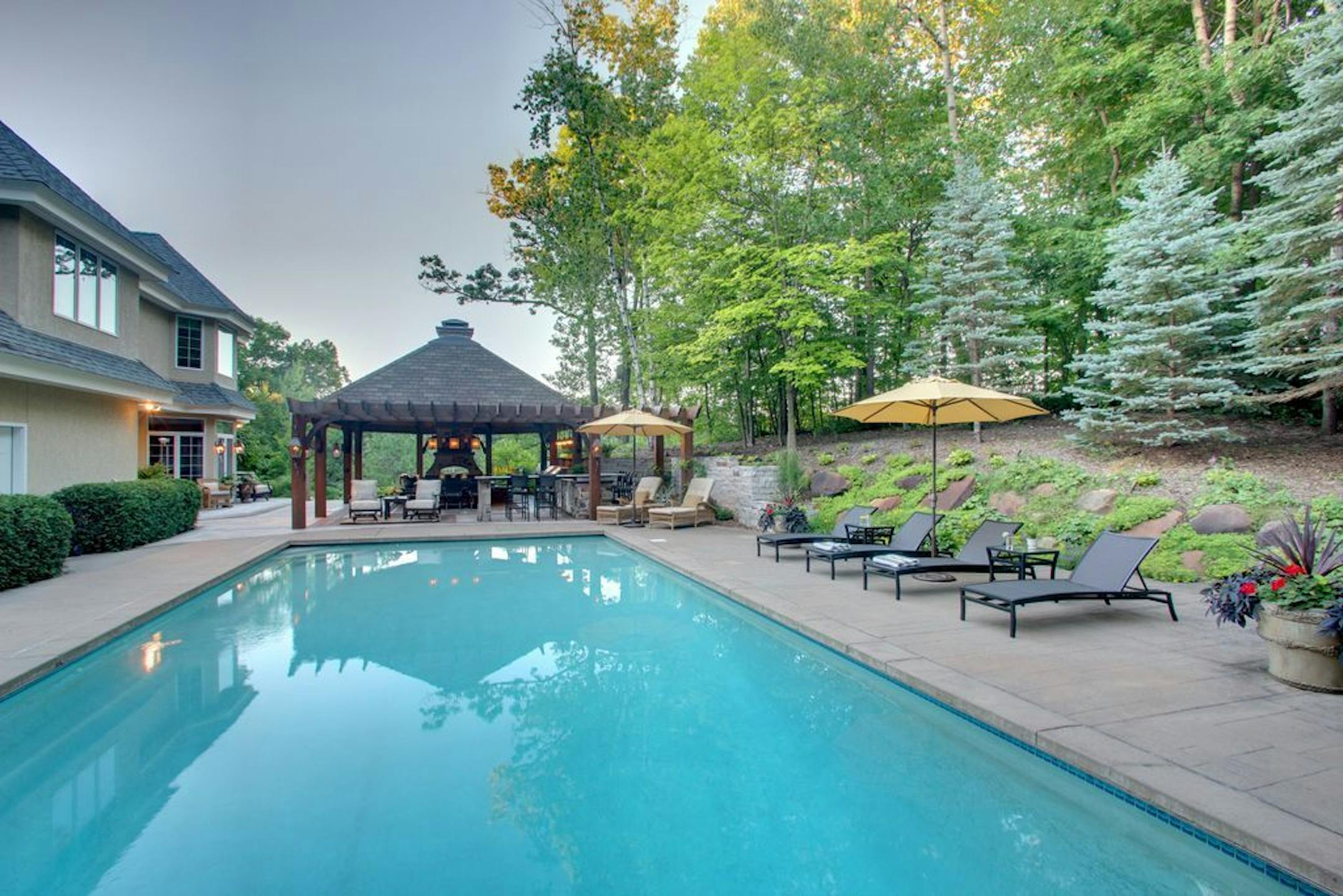 The pavilion overlooks a large pool.