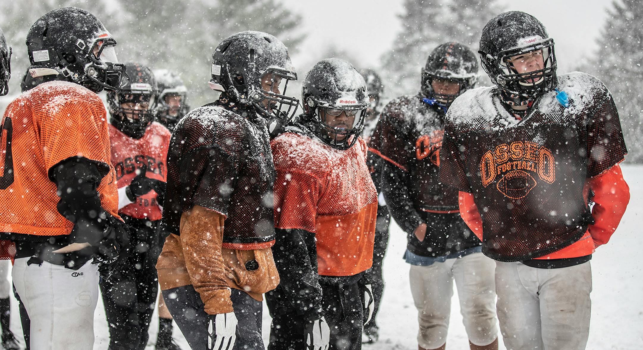 Members of the Osseo teampracticed outside in the heavy snow in preparation for their Friday night game against Totino-Grace.