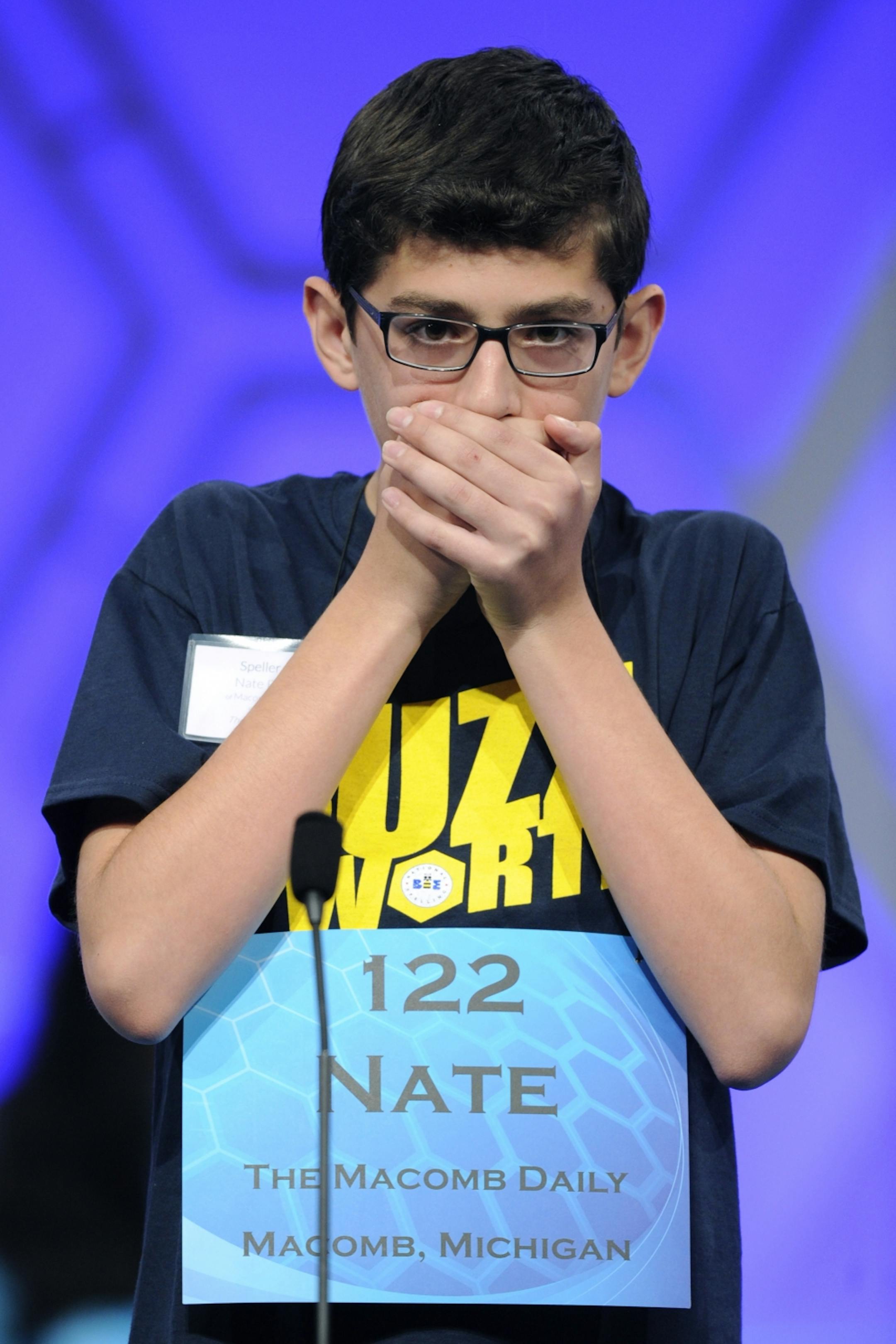Nathaniel Britton, 14, of Macomb, Mich., spells the word "incorruptible" during the 2105 Scripps National Spelling Bee in Oxon Hill, Md., Wednesday, May 27, 2015.