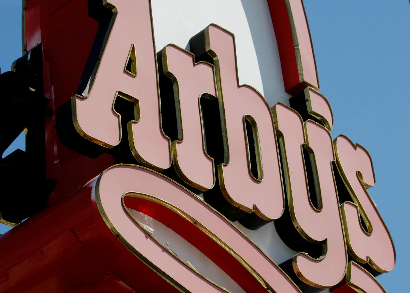 FILE - In this Monday, March 1, 2010 file photo, an Arby's restaurant sign is shown in Cutler Bay, Fla. Wendy's/Arby's Group Inc. said Monday, June 13, 2011, it has agreed to sell a majority stake in its struggling Arby's brand to a private equity group. (AP Photo/Wilfredo Lee, file)