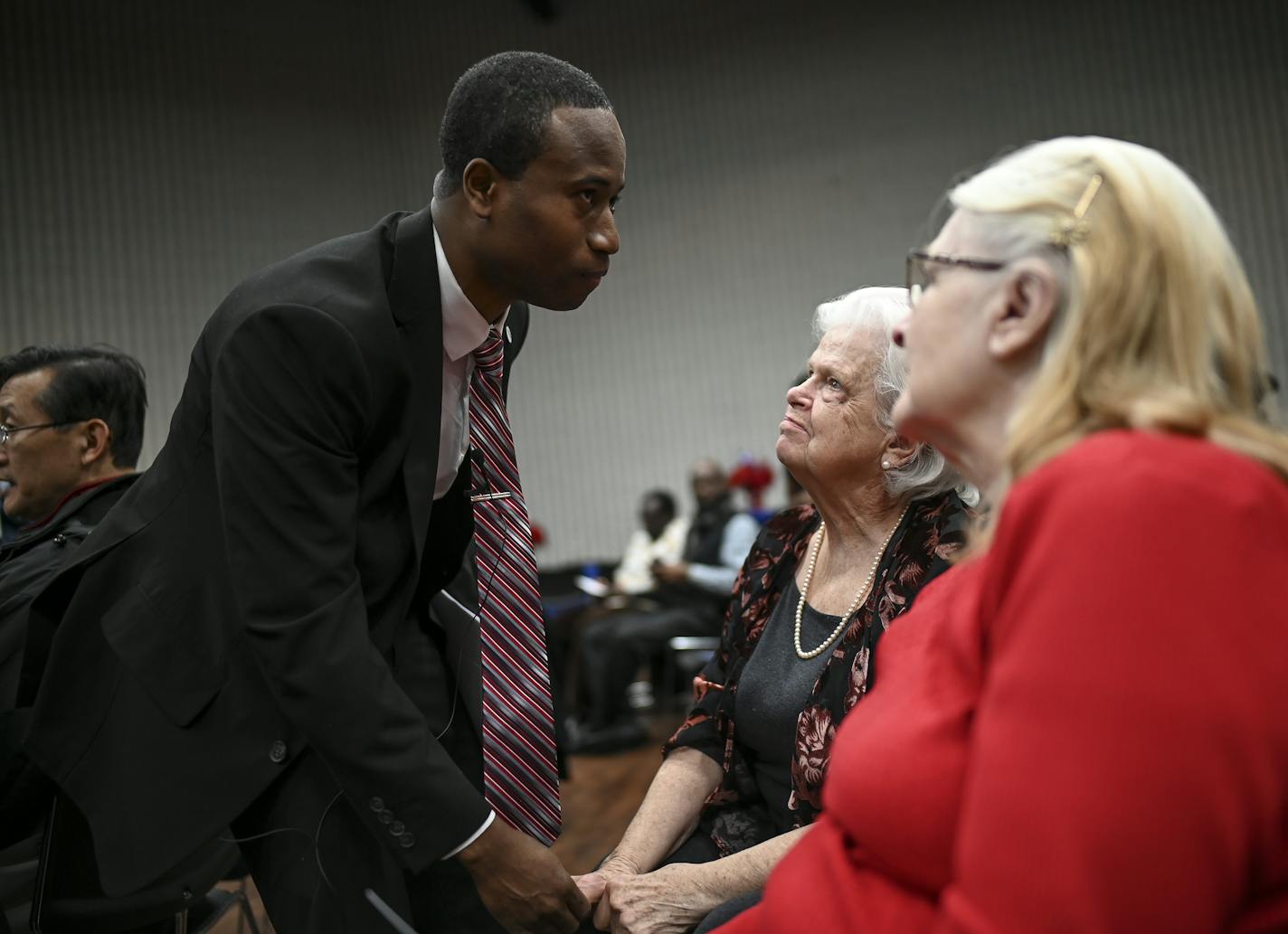 Former Brooklyn Center mayor Myrna Kratness was greeted by Brooklyn Center Mayor Mike Elliot before the start of Elliot's inauguration ceremony Wednesday night. Kratness was the city's first female mayor when she served from 1995-2006. She sat beside her friend, Karen Youngberg, right. Both Kratness and Youngberg have known Elliot since he was in high school through the Brooklyn Center Rotary Club. ] Aaron Lavinsky &#xa5; aaron.lavinsky@startribune.com Brooklyn Center's new mayor, Mike Elliot, w