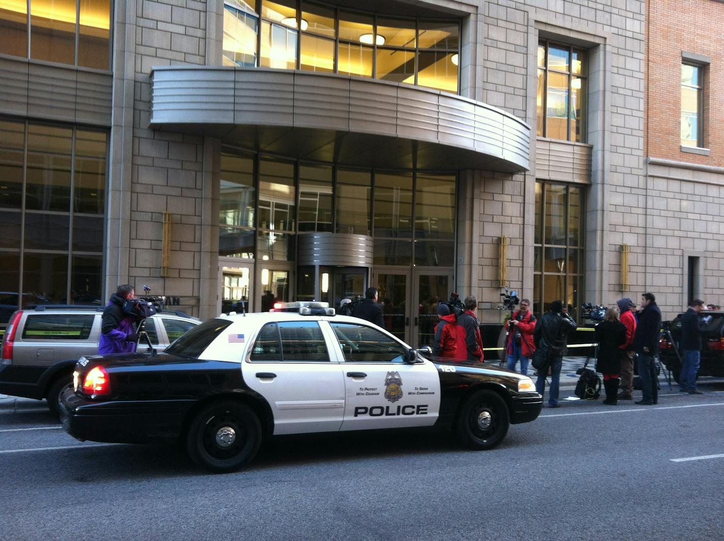 Police investigate a report of shots fired at a building leased by Target Corp. at 10th and Nicollet.