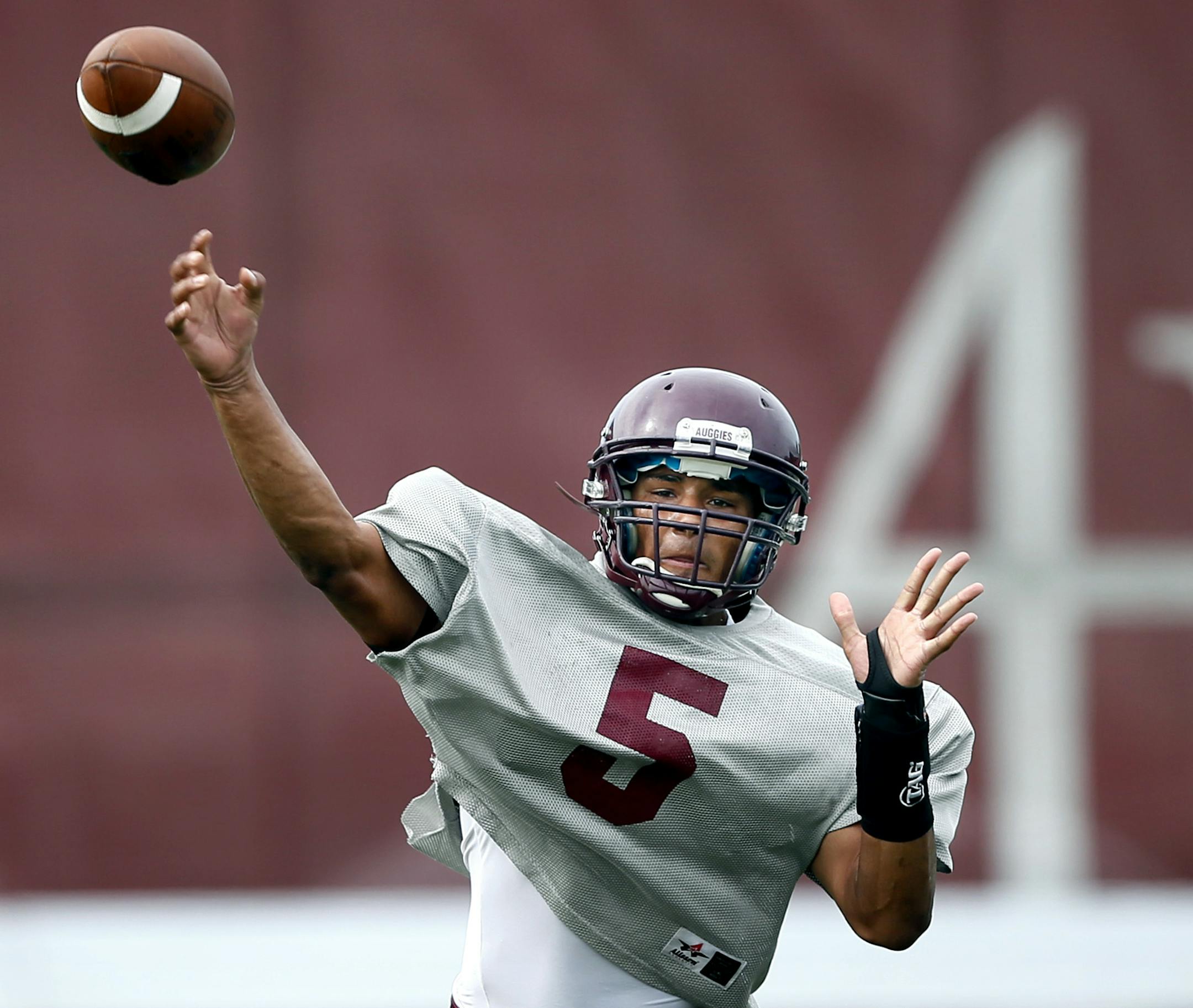 Augsburg quarterback Aryton Scott practiced at the college Thursday August 28 , 2014 in Minneapolis, MN . ] Jerry Holt Jerry.holt@startribune.com