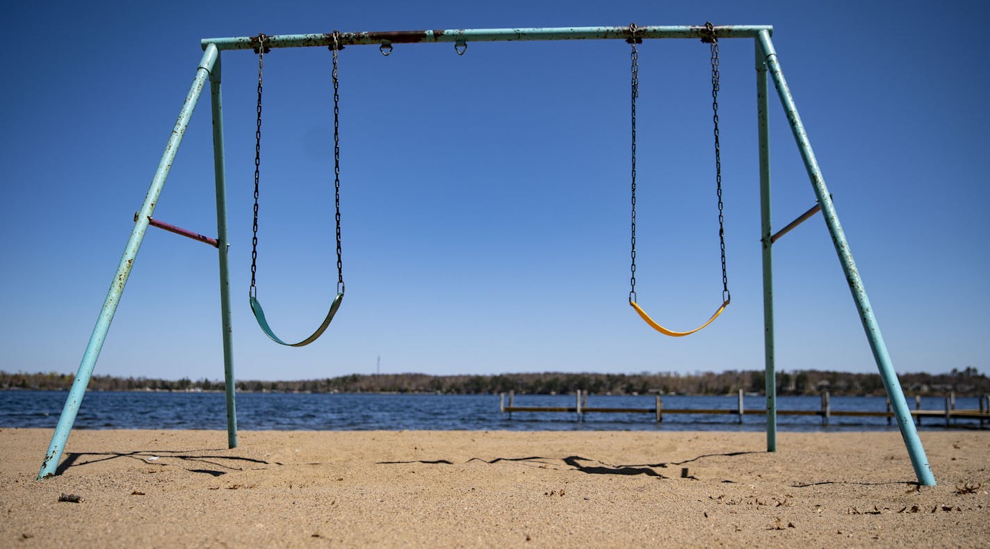 An empty swing set sat on the beach behind Cragun's Resort on Gull Lake on Monday. ] ALEX KORMANN • alex.kormann@startribune.com Resorts around Minnesota have been scrambling to figure out ways to salvage the tourist season among the COVID-19 pandemic. Grand View Lodge and Cragun's Resort on Gull Lake are two hot spots in Nisswa, MN that have altered their normal business plans to try and make their properties safer and ready for any and all visitors as soon as the governor lifts the stay-at-hom