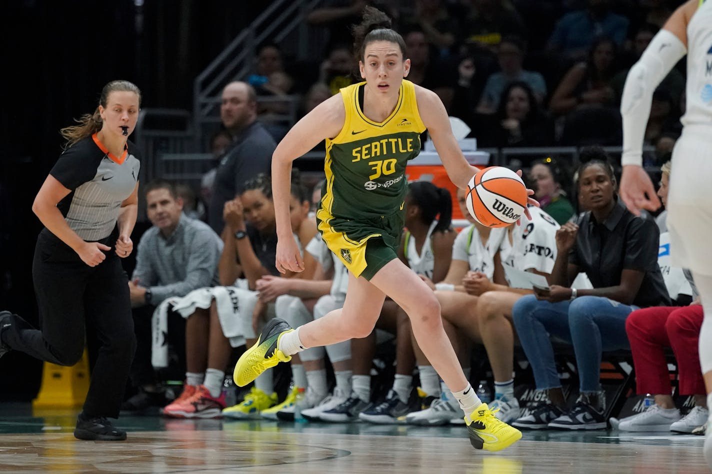 Seattle Storm forward Breanna Stewart brings the ball up against the Minnesota Lynx during the first half of a WNBA basketball game Wednesday, Aug. 3, 2022, in Seattle. The Storm won 89-77. (AP Photo/Ted S. Warren)