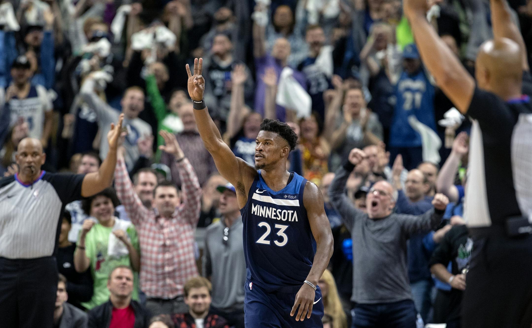 Minnesota Timberwolves Jimmy Butler (23) after making a three pointer in the fourth quarter.