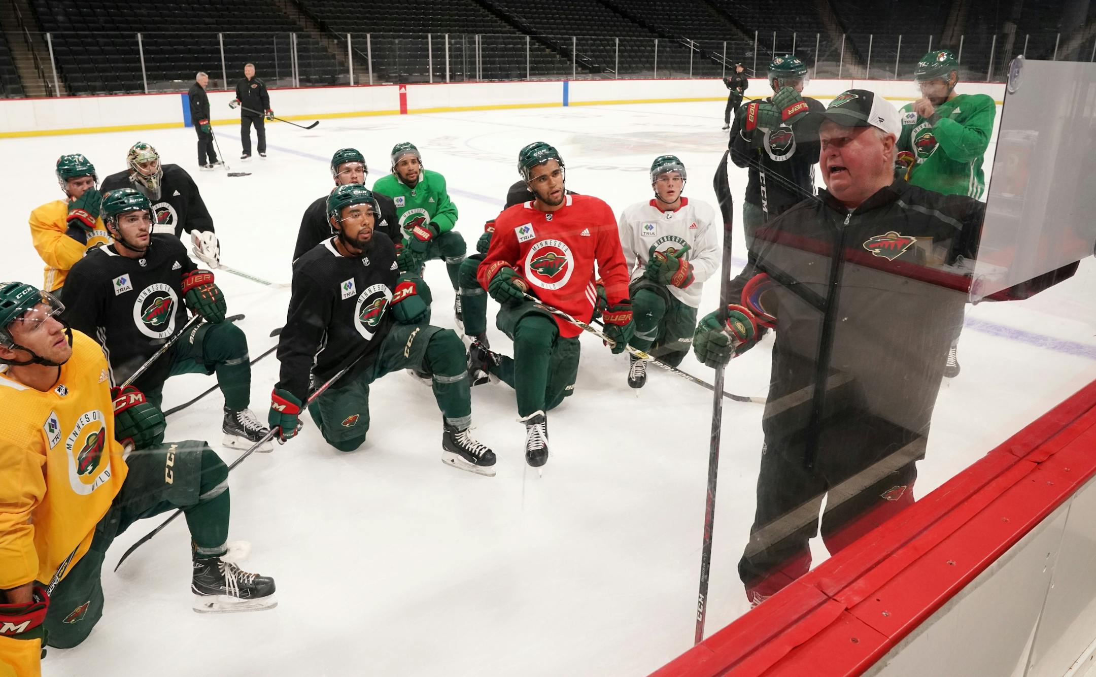 Minnesota Wild head coach Bruce Boudreau talked with his players between drills.