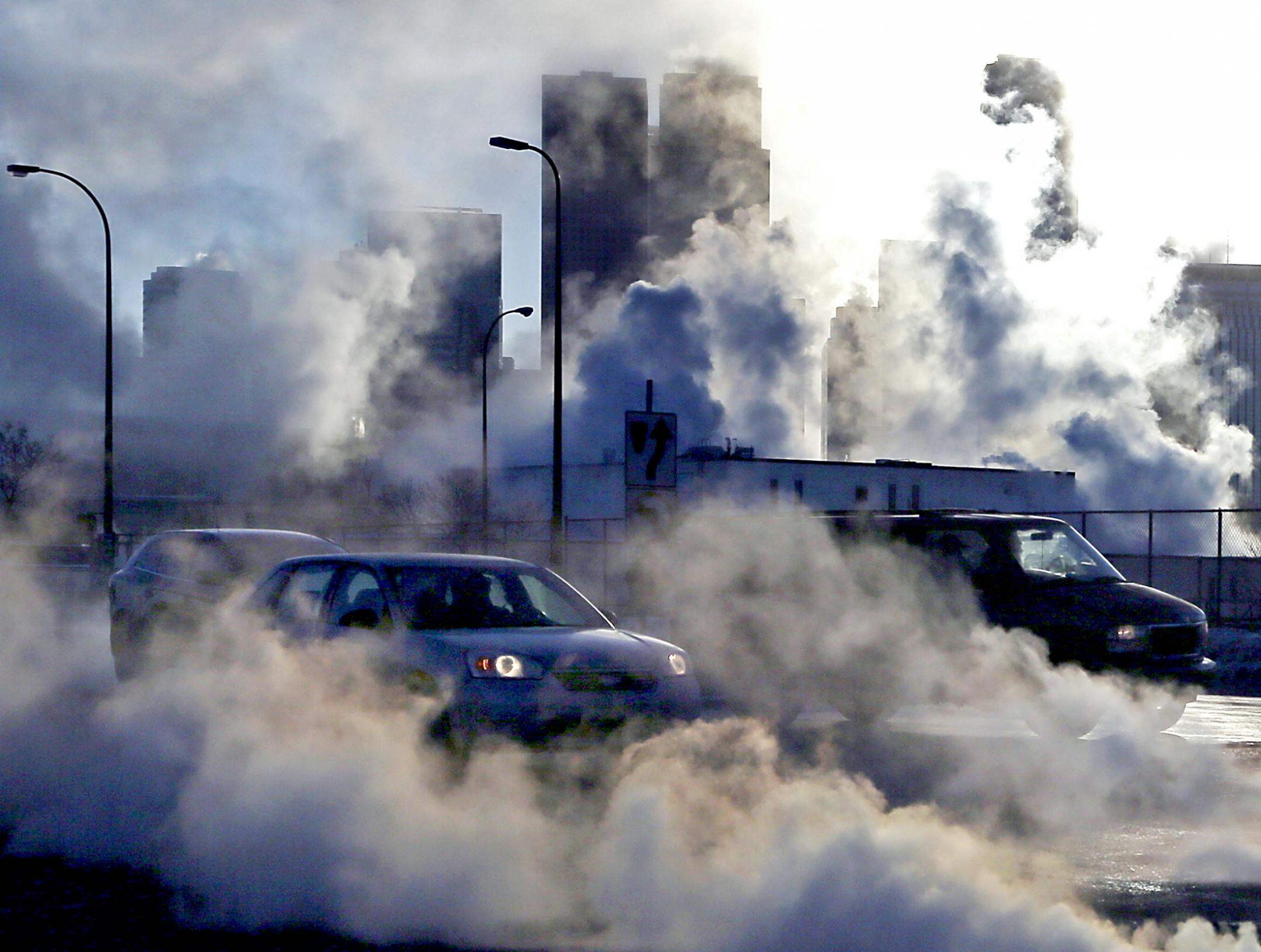 The collision of cold air and heat from car exhaust and steam from buildings is visible near Olson Memorial and Lyndale Ave. N. Thursday Jan. 23, 2014, in Minneapolis, MN.