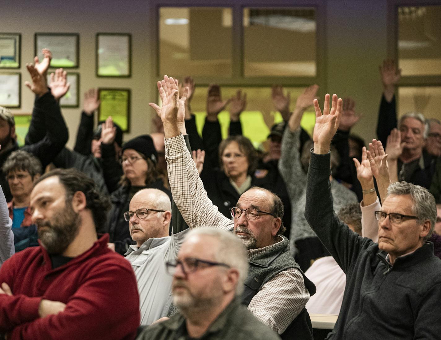 Those who approved a motion to refuse refugee resettlement raised their hands in the overcapacity crowd in attendance.] Beltrami County is the latest in Minnesota to vote on refugee resettlement -- and may be the first in Minnesota to ban it under the new Trump adminstration policy.RICHARD TSONG-TAATARII &#xa5; richard.tsong-taatarii@startribune.com