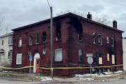 The Duluth building where a fire Saturday left two people dead and two firefighters injured. It was the building’s third fatal fire in as many years