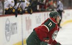 Wild left wing Zach Parise (11) struggled to get to his feet after a hit into the boards in the first period Thursday night. ] JEFF WHEELER &#xef; jef