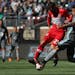 Minnesota United defender Francisco Calvo (5) and Chicago Fire forward Nemanja Nikolic (23) fought for the ball in the first half. ] ANTHONY SOUFFLE &