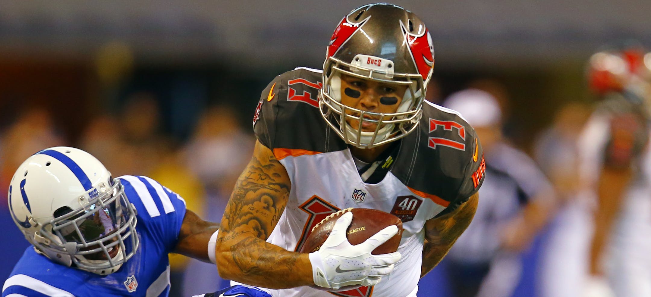 Tampa Bay Buccaneers wide receiver Mike Evans (13) makes a catch against the Indianapolis Colts during an NFL football game in Indianapolis, Sunday, Nov. 29, 2015. (Jeff Haynes/AP Images for Panini)