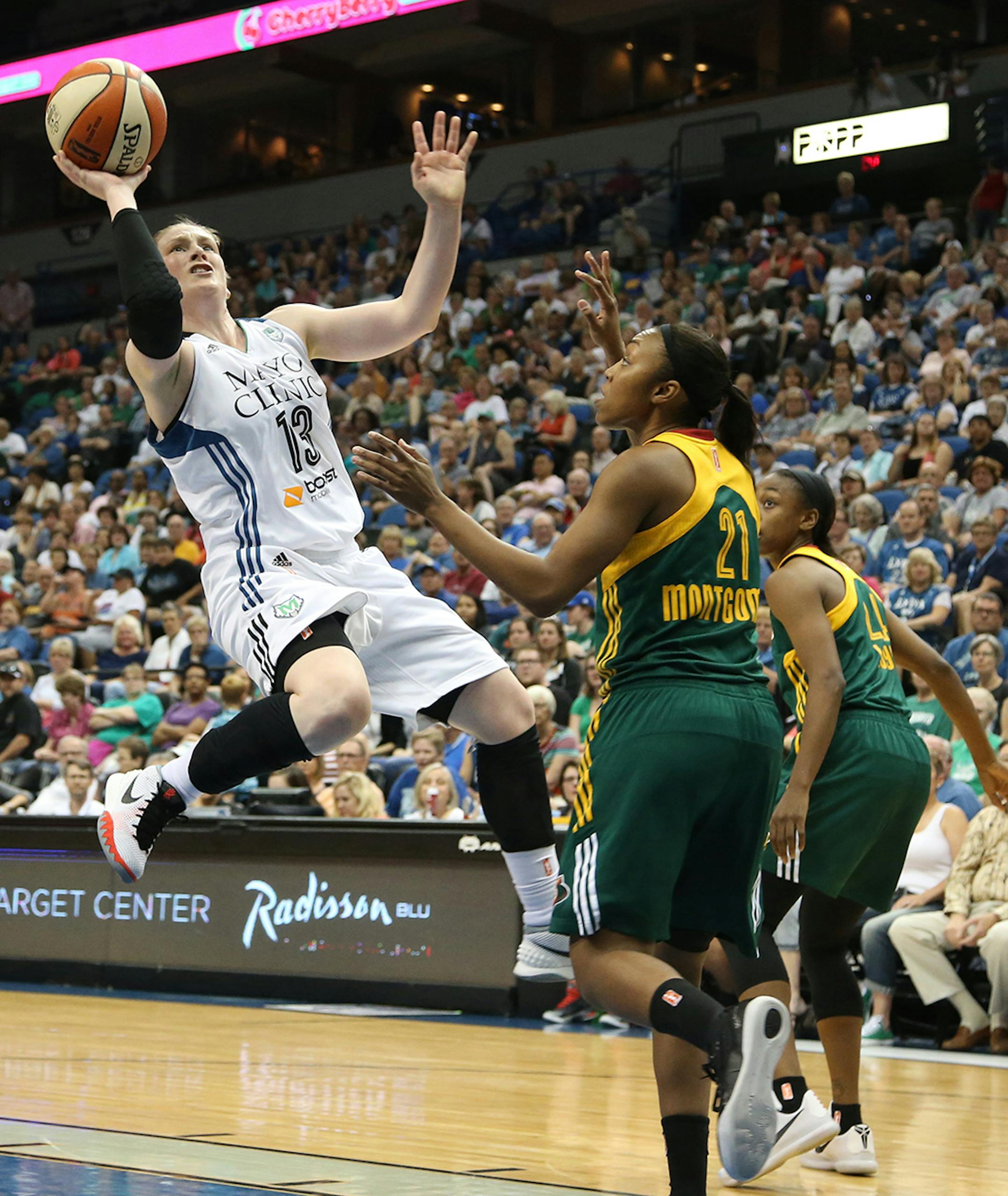 Lynx Lindsay Whalen went up for a basket after driving the lane passed Seattle defender Renee Montgomery during the first half.
