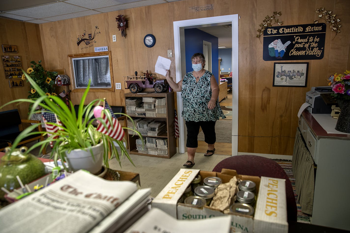 Pam Bluhm revived the Chatfield News after it closed. Now she's being sued by a rival publisher, who claims she's illegally using the name and subscription list of the paper that he bought from the previous owner and closed in March.