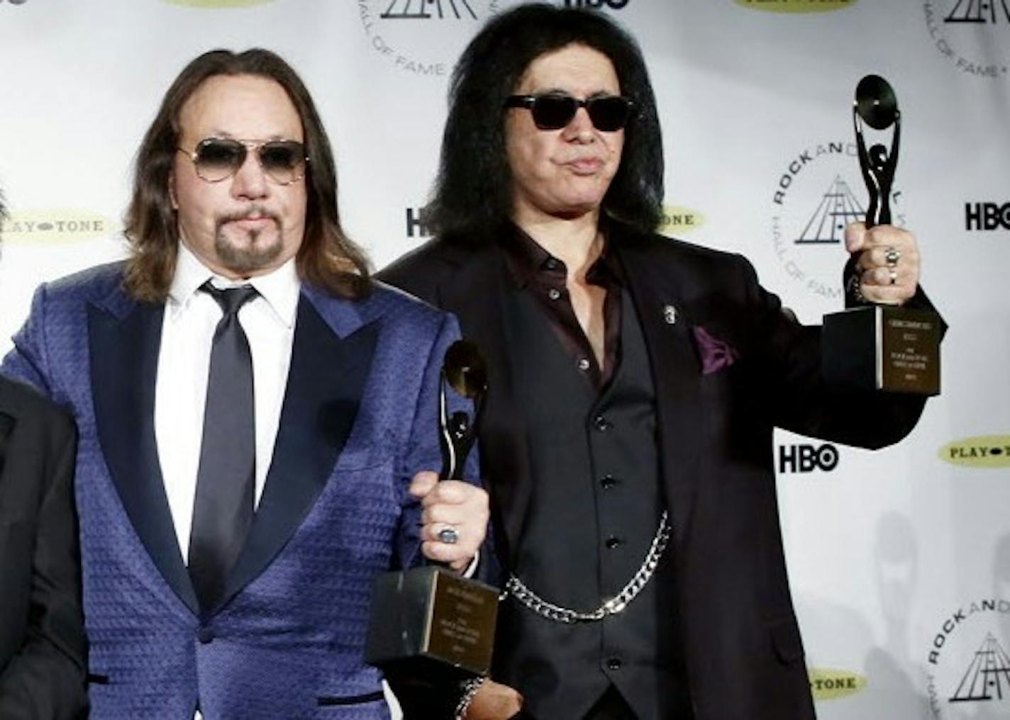 Ace Frehley and Gene Simmons appeared on stage but would not perform together when Kiss finally got into the Rock and Roll Hall of Fame in 2004. / PatrickMcMullan.com via AP Images