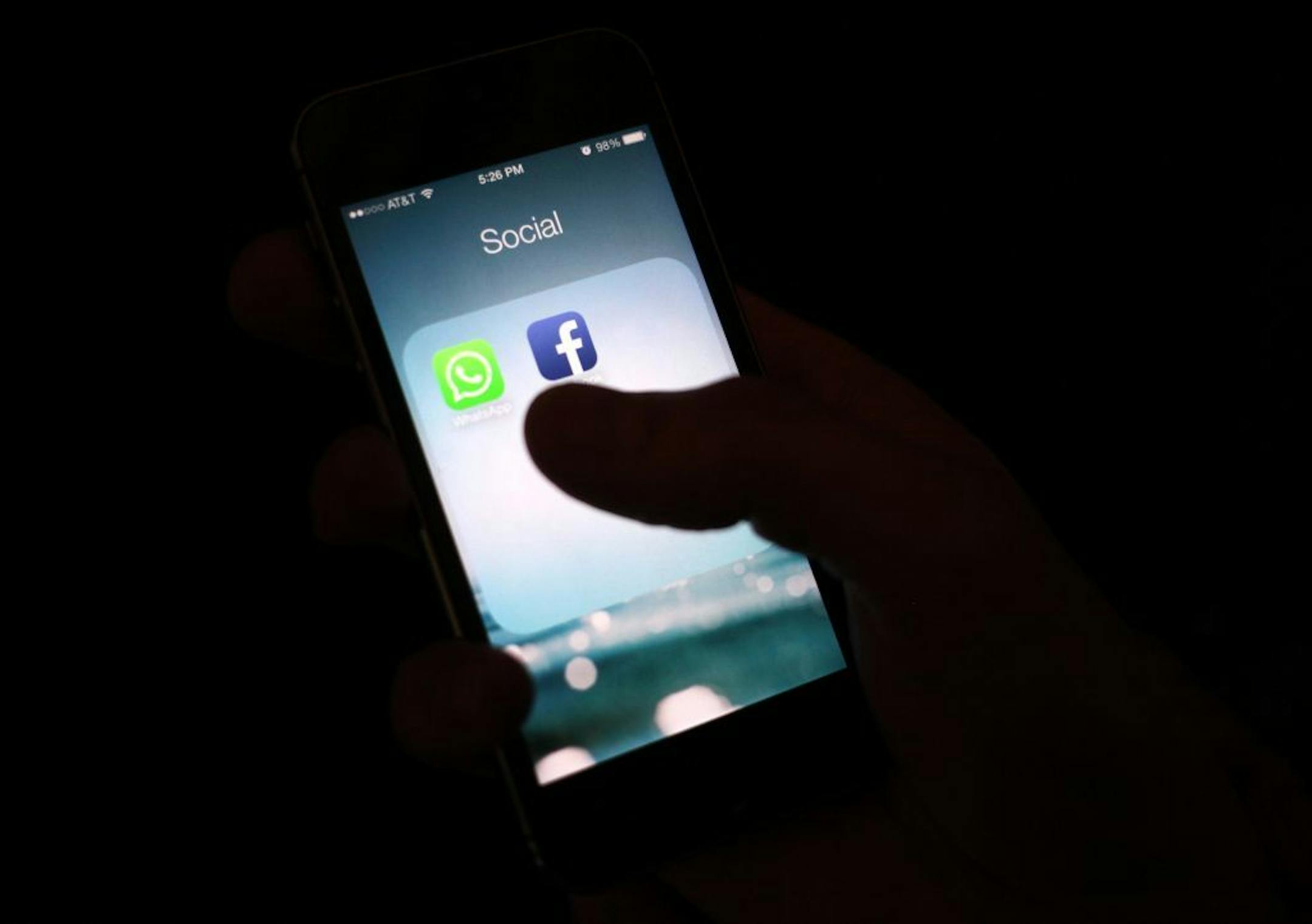 Facebook app icons on an iPhone.