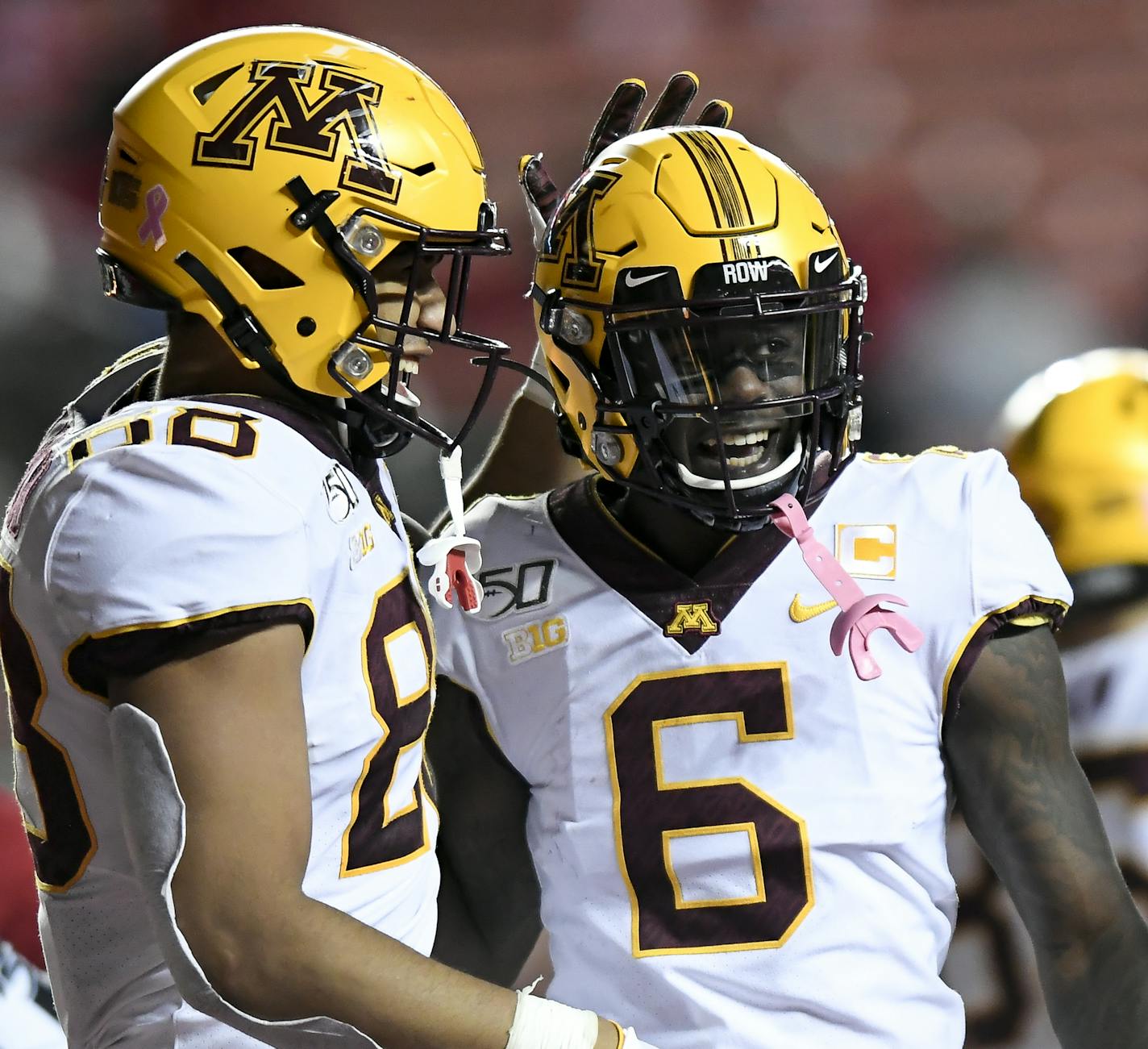 Gophers tight end Brevyn Spann-Ford (88) and wide receiver Tyler Johnson (6) celebrated Johnson's fourth quarter touchdown reception against Rutgers. ] Aaron Lavinsky &#x2022; aaron.lavinsky@startribune.com The Gophers played Rutgers on Saturday, Oct. 19, 2019 at SHI Stadium in Piscataway, N.J..