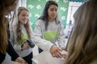 Mounds View High students Hannah Berndt, left, and Sanjana Dutt, center, from H.E.A.R.T - Helping Every At-Risk Teen - organized a wellness week by ha