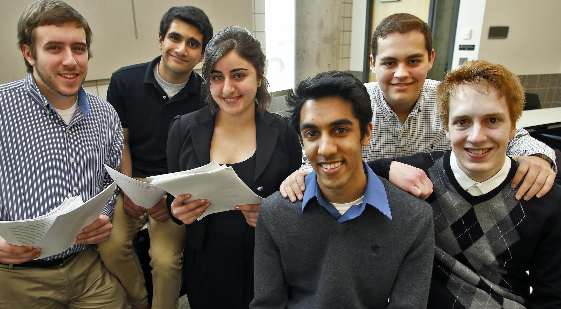 John Rodgers, Farez Siddiqui, Miriam Hadidi, Kanad Gupta, Kevin Hyde, and Alex Radunz, l-r. ] The team of six Uo M business school students authored a winning paper among 600 freshmen recommending against the Iron Range PolyMet mine project. Eahc received a $1,000 scholarship from Securian Financial, which sponsored and judged the student competition (MARLIN LEVISON/STARTRIBUNE(mlevison@startribune.com)